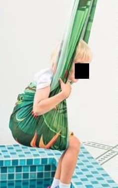 Recalled TheKiddoSpace Sensory Swing in use - jungle print