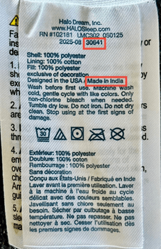 The sewn in label with the batch code and "Made in India" circled
