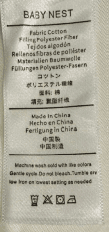 "BABY NEST" is printed on an attached label inside the baby lounger’s cover.