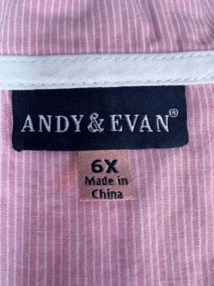 "Andy & Evan" and the size are printed on the sewn-in neck label